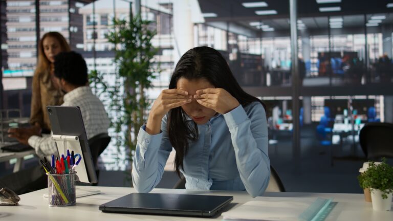 Overwhelmed indian businesswoman faces a tough day at the office